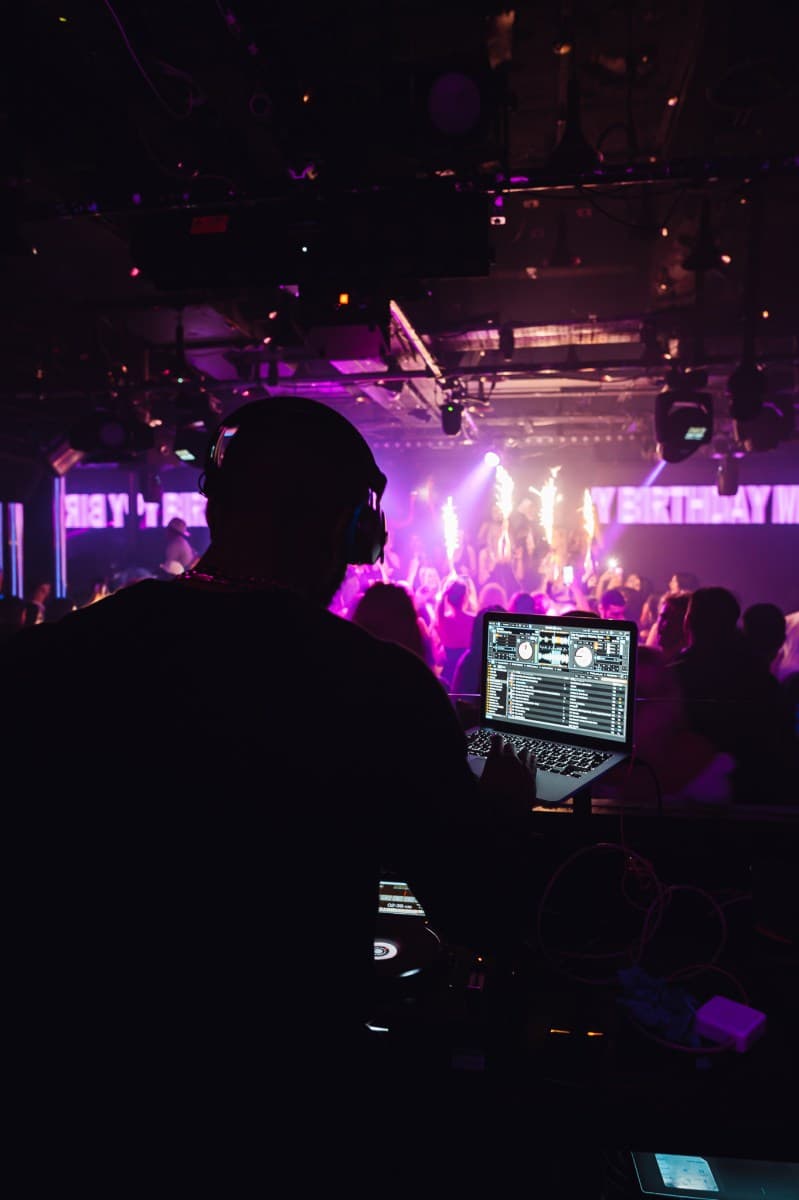 Group celebrating an 18th birthday at a London nightclub with sparklers and bottle service