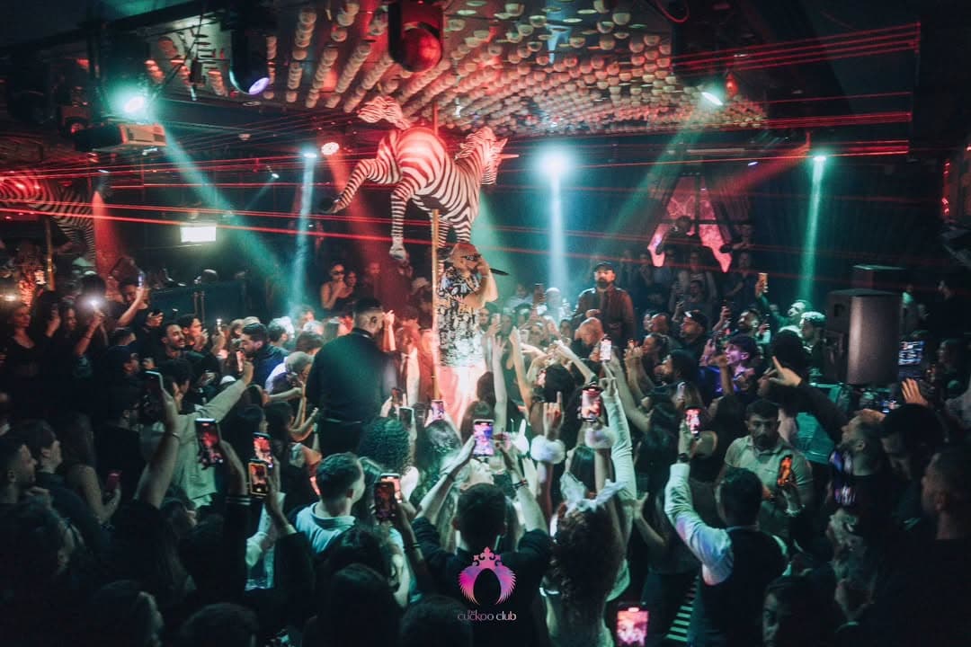 Crowd and a sparkler show under the mirrored ceiling when the venue traded as the Cuckoo Club