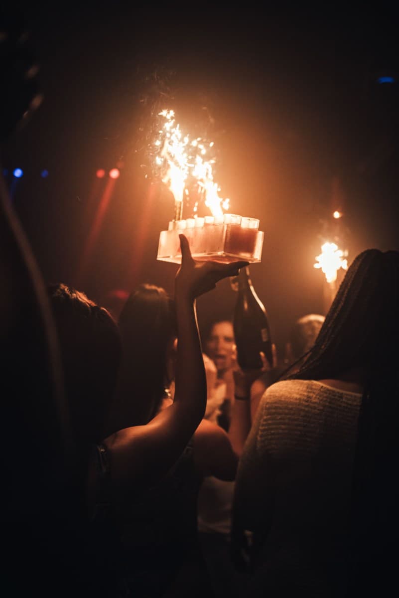 Birthday celebration at a London nightclub with sparklers and VIP table