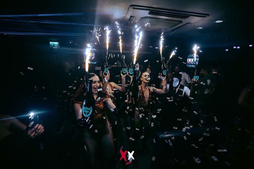 Bottle presenters with sparklers at Luxx Club, before the club closed
