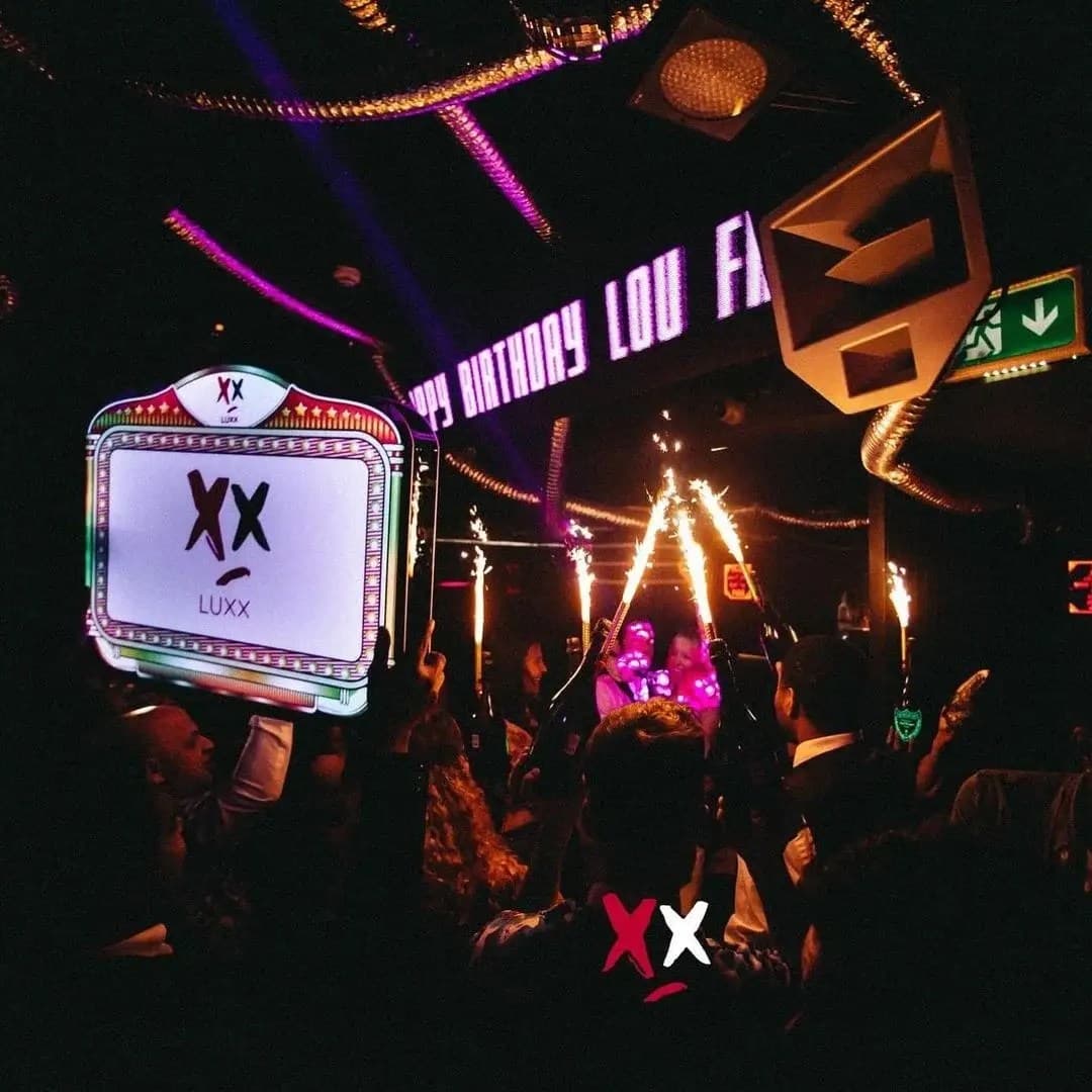 Luxx Club London interior with modern design and VIP table area