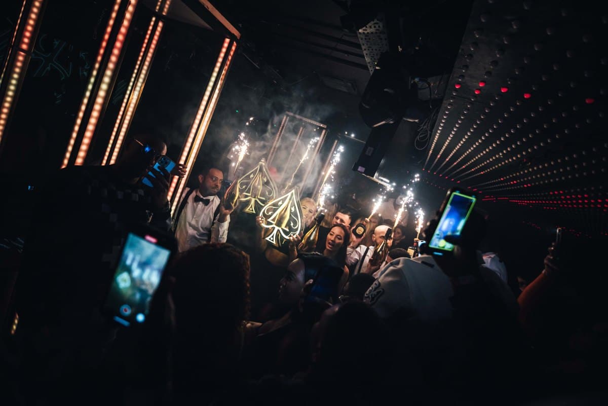 Tape London nightclub interior with VIP booths and moody lighting