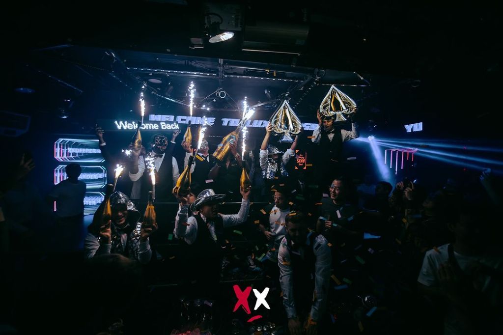 Luxx Club London table clients enjoying a bottle show.