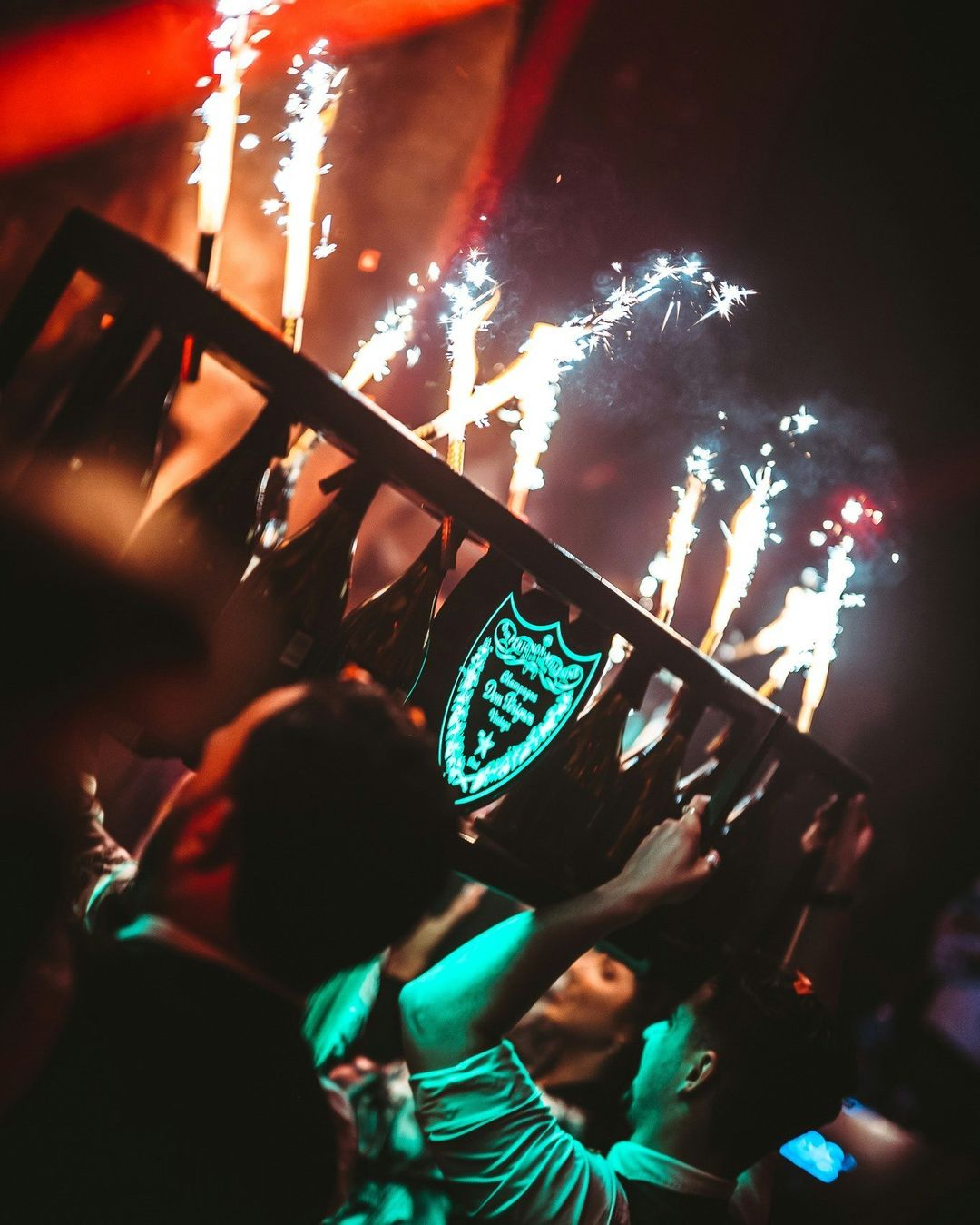 Reign London Dom Perignon bottle presenter during a bottle show